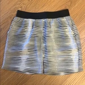 Size 4. Elastic waistband- excellent condition